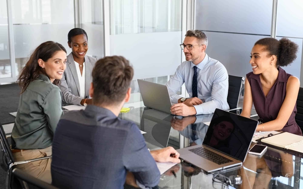 Group-of-people-having-a-meeting-at-large-table